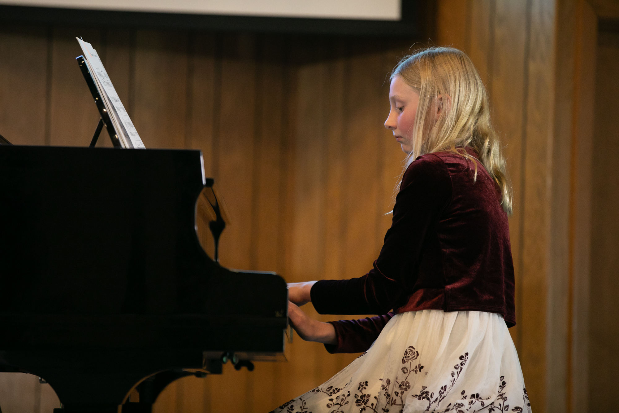 Student performing piano for the Michigan Music Festival